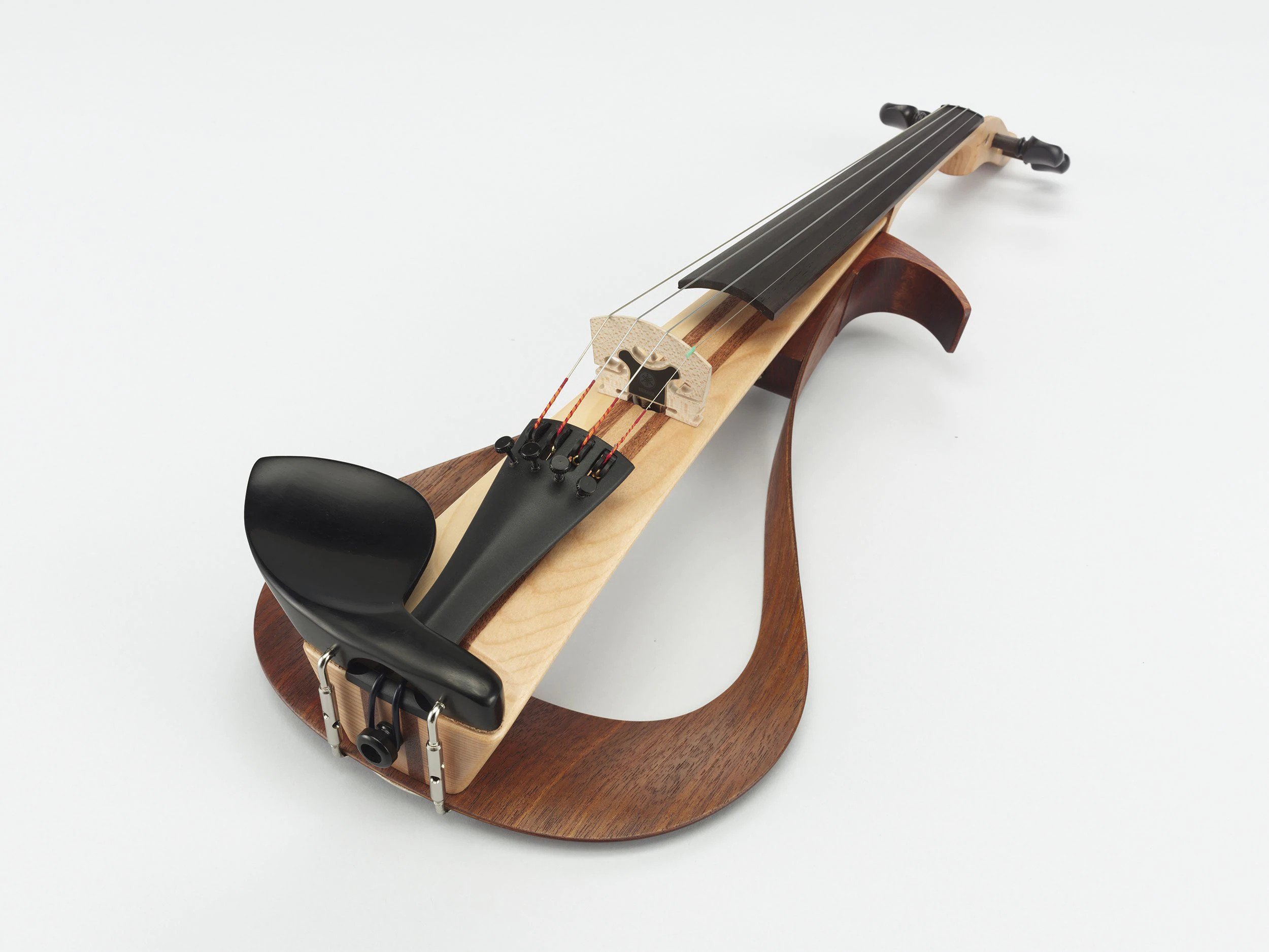 Organic form enhances the feel and qualities of the woods used
