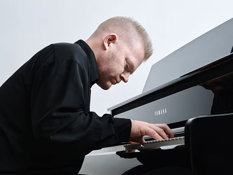 Experience the sensation of playing a living piano